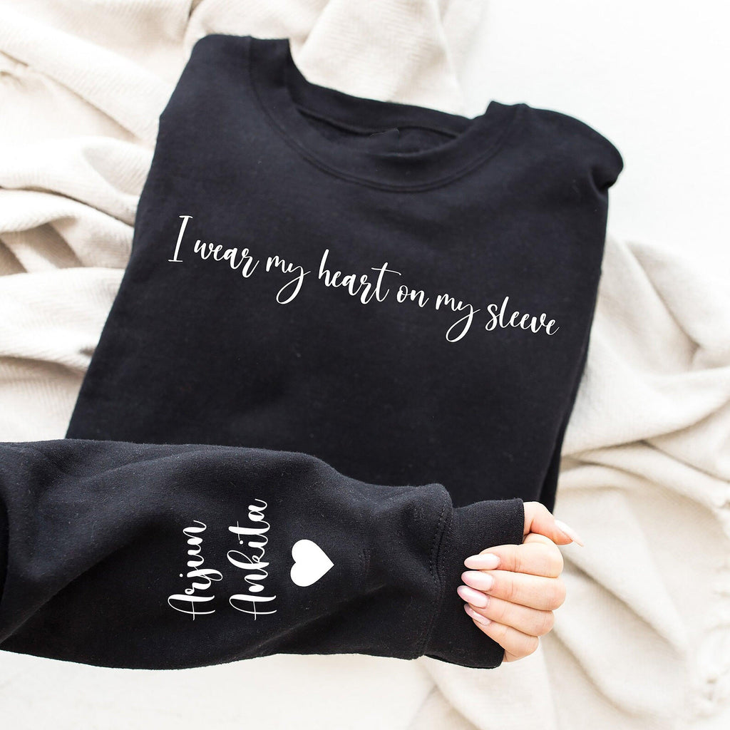 Heartstrings Harmony: Customized Sweatshirt with Your Loved One's Name Adorning the Sleeve - Young Trendz